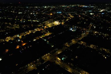 Beautiful Aerial view of British Town at Night and Live Fireworks on Asians Wedding