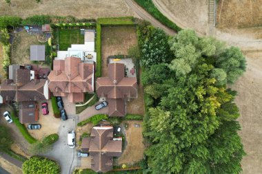 Aerial View of Caldecotte Lake at Sunset. A beautiful lake split across 2 sides, drone's high angle footage