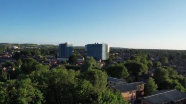 Aerial Footage of British City of Luton, England, Close to Leagrave Railway Station, Train on Tracks and Houses