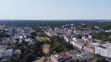Beautiful Aerial View of Sea View and Sandy Beach of Bournemouth City of England UK, Drone's footage. People are Enjoying hot weather of England on 18th July 2022