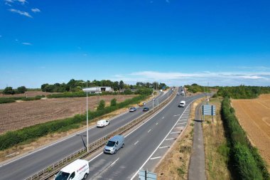 High Angle View of British Motorways at M1. Highways are Passing from Beautiful Landscape with agricultural farms