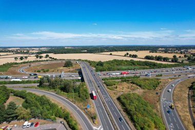 High Angle View of British Motorways at M1. Highways are Passing from Beautiful Landscape with agricultural farms