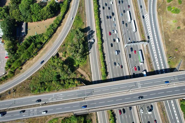 High Angle View of British Motorways at M1. Highways are Passing from Beautiful Landscape with agricultural farms