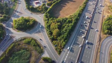 Aerial View of British Motorways With Traffic at Peak Time, High Angle Footage taken with drone's camera at Luton City of England UK, M1 J11 Motorways Junction Interchange.