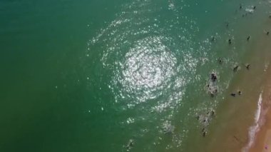 Beautiful Aerial View of Sea View and Sandy Beach of Bournemouth City of England UK, Drone's footage. People are Enjoying hot weather of England on 18th July 2022