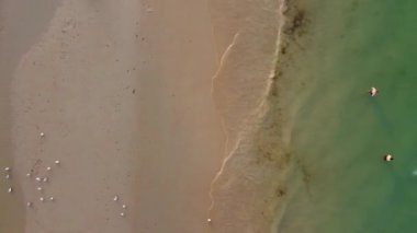 Beautiful Aerial View of Sea View and Sandy Beach of Bournemouth City of England UK, Drone's footage. People are Enjoying hot weather of England on 18th July 2022
