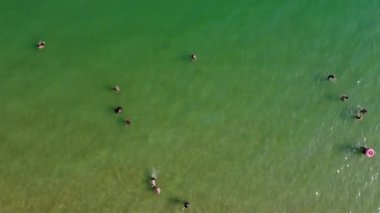 Beautiful Aerial View of Sea View and Sandy Beach of Bournemouth City of England UK, Drone's footage. People are Enjoying hot weather of England on 18th July 2022