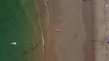 Beautiful Aerial View of Sea View and Sandy Beach of Bournemouth City of England UK, Drone's footage. People are Enjoying hot weather of England on 18th July 2022