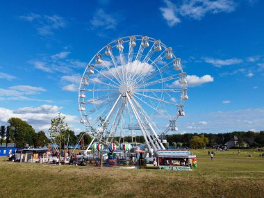 High Angle Footage of Willen Lake, Water Sports and Public Park of England. which is located at Milton Keynes, England.+ People are Enjoying at Lake on a Hot Sunny Day of Summer. Video Clip Captured on 21-Aug-2022. Beautiful Aerial Drone's Footage.
