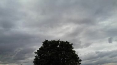 Fast Moving Morning View of Above The Clouds over British Town. Time Lapse Footage of Clouds at Sunrise Time
