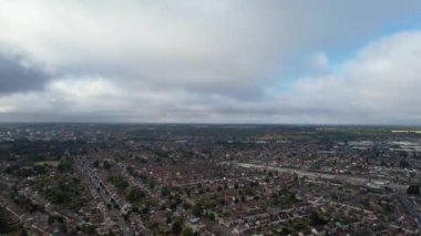 dramatic clouds and blue sky over British City