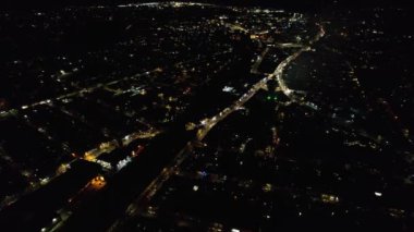 Night Aerial View of Illuminated British City. Drone's Footage of Luton Town of England at Night