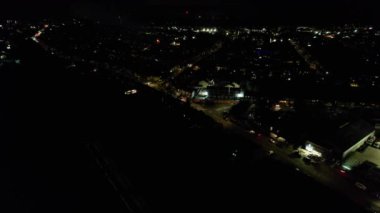 Night Aerial View of Illuminated British City. Drone's Footage of Luton Town of England at Night