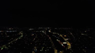 Night Aerial View of Illuminated British City. Drone's Footage of Luton Town of England at Night
