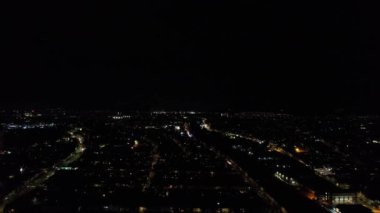Night Aerial View of Illuminated British City. Drone's Footage of Luton Town of England at Night