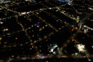 Night Aerial Footage of Luton City of England. Drone's Night Flight over Luton Town of England. it was Asian wedding when they were enjoying the party and live fireworks, (high angle view with drone's camera)