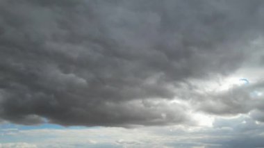 Fast Moving  Clouds over British Town. Time Lapse Clip