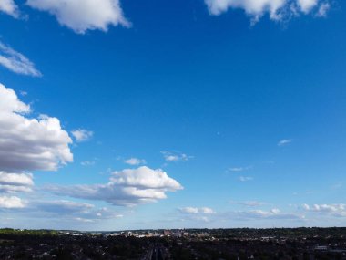 Aerial View of clouds and City houses. Beautiful High Angle Altitude View of Clouds and British Town of England UK, Air plane view at 360 degree.