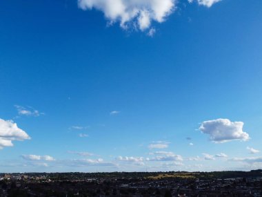 Aerial View of clouds and City houses. Beautiful High Angle Altitude View of Clouds and British Town of England UK, Air plane view at 360 degree.