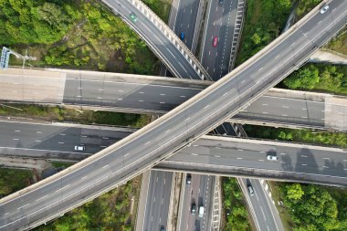 High Angle View of British Motorways at M1 and M25 Interchange. Highways are Passing from Beautiful Landscape with agricultural farms. Aerial View was captured with drone's camera on 7th Sep 2022. 