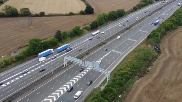 Aerial View British Motorways Fast Moving Traffic Peak Time J11 — 图库视频影像