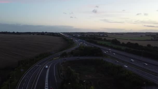 Aerial View British Motorways Fast Moving Traffic Peak Time J11 — Stockvideo