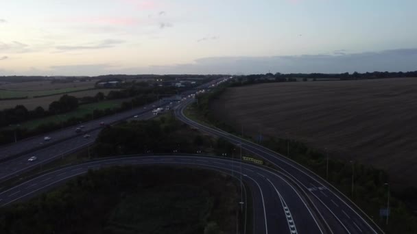 Aerial View British Motorways Fast Moving Traffic Peak Time J11 — Vídeo de stock