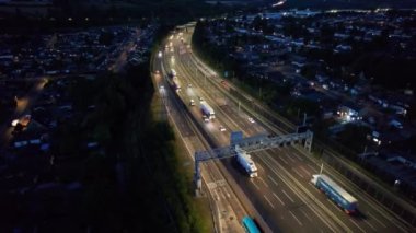 Aerial View of British Motorways With Fast Moving Traffic at Peak Time. M1 J11 and  J7 Motorways Junction Interchange. Time Lapse Shot captured on 7th Sep 2022