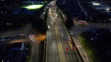 Aerial View of British Motorways With Fast Moving Traffic at Peak Time. M1 J11 and  J7 Motorways Junction Interchange. Time Lapse Shot captured on 7th Sep 2022