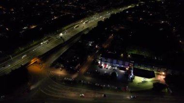 Aerial View of British Motorways With Fast Moving Traffic at Peak Time. M1 J11 and  J7 Motorways Junction Interchange. Time Lapse Shot captured on 7th Sep 2022