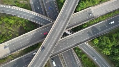 Aerial View of British Motorways With Fast Moving Traffic at Peak Time. M1 J11 and  J7 Motorways Junction Interchange. Time Lapse Shot captured on 7th Sep 2022