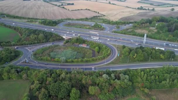 Aerial View British Motorways Fast Moving Traffic Peak Time J11 — Stock Video