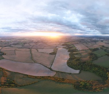 Beautiful and Dramatic Clouds at Sunset Time over British Countryside Landscape