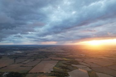 Beautiful and Dramatic Clouds at Sunset Time over British Countryside Landscape