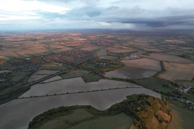 Beautiful and Dramatic Clouds at Sunset Time over British Countryside Landscape