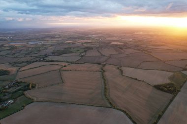 Beautiful and Dramatic Clouds at Sunset Time over British Countryside Landscape