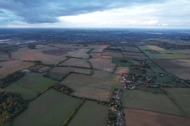 Beautiful and Dramatic Clouds at Sunset Time over British Countryside Landscape