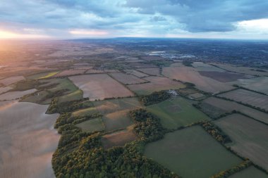Beautiful and Dramatic Clouds at Sunset Time over British Countryside Landscape