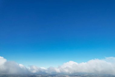 Scenic view of blue sky with white clouds at sunny daytime 