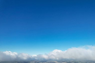 Scenic view of blue sky with white clouds at sunny daytime 