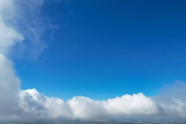 Scenic view of blue sky with white clouds at sunny daytime 