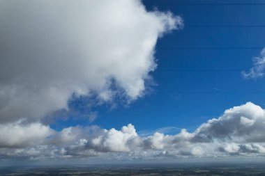 Beautiful Blue Sky with Clouds on a Clear Sunny Day over City