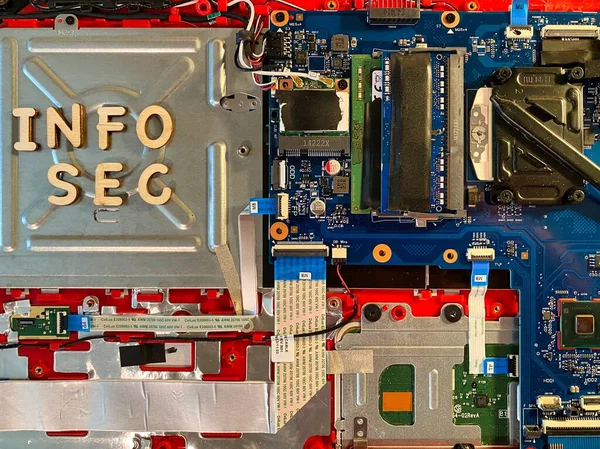 The word INFO SEC on a futuristic looking laptop motherboard. This would be a great graphic for your next security awareness training.
