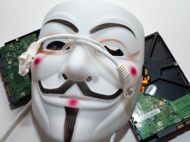 Guy Fawkes, Anonim Hacker maskesi gibi. Siber güvenlik uygulaması için mükemmel görüntüler.