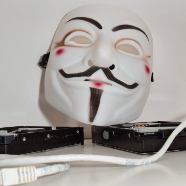 Guy Fawkes like Anonymous style hacker mask. Excellent imagery for cybersecurity application.