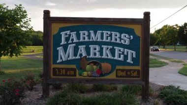 Olathe, Kansas - August, 18 2022 - Olathe Kansas Farmers Market at the Community Center - Overcast colorful day