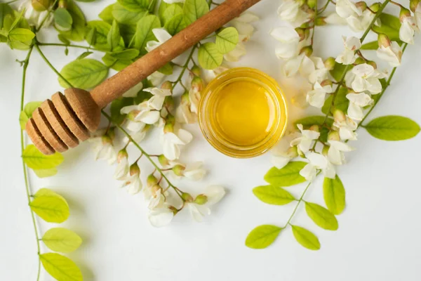 ACACIA HONEY. acacia flowers and jar