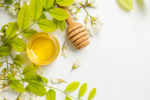 ACACIA HONEY. acacia flowers and jar