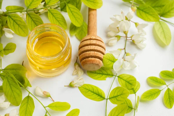 ACACIA HONEY. acacia flowers and jar