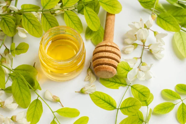 ACACIA HONEY. acacia flowers and jar